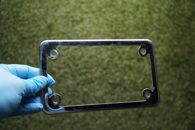 Harley-Davidson Chrome License Plate Bezel 7-3/8” x 4-1/4” – Fair Condition